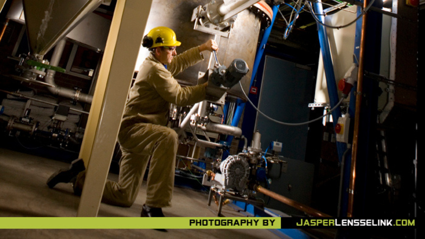 Worker engaged in biomass production