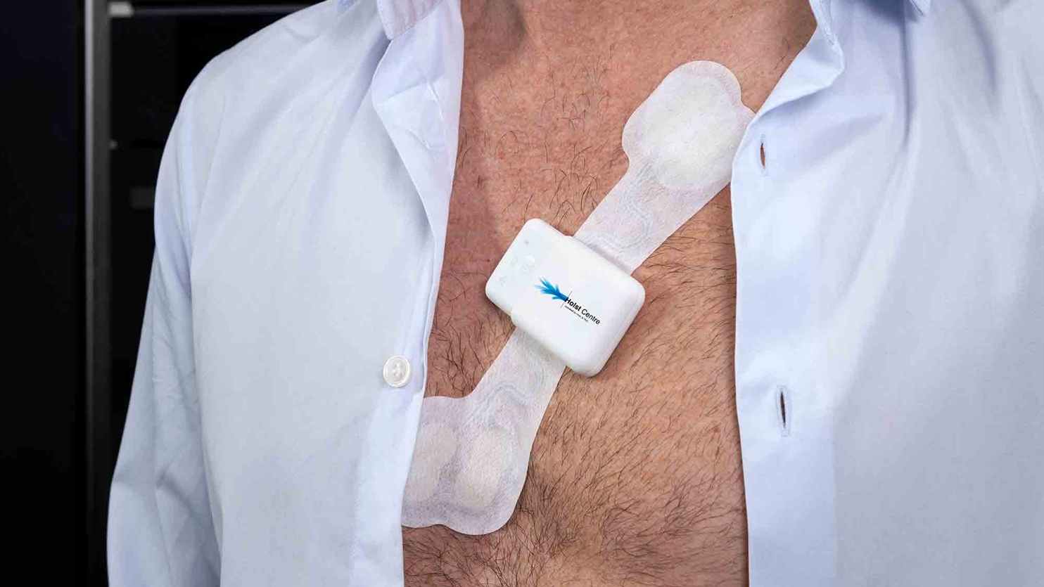 Man wearing a health patch on his chest