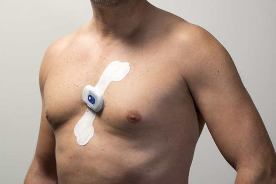 Man with a health patch attached to his chest.